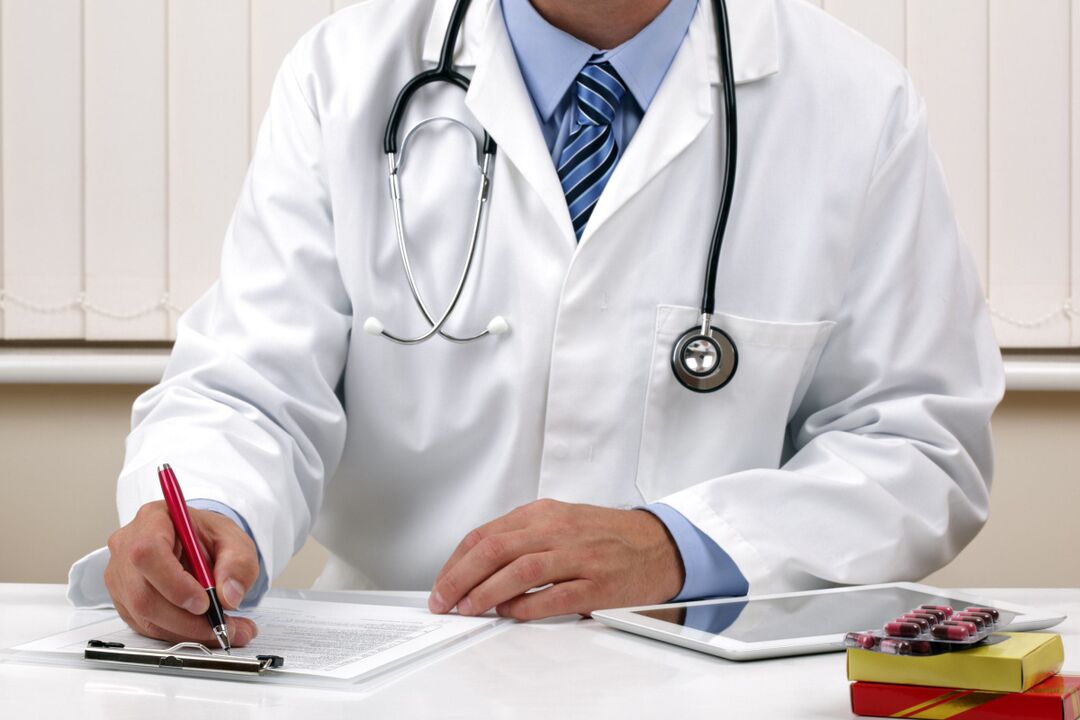 a doctor prescribes treatment for worms